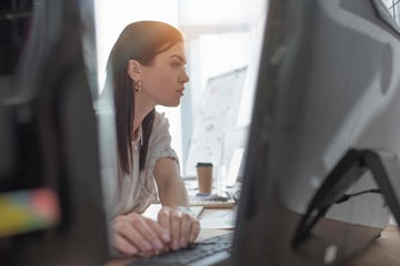 HR Tech Working On Computer