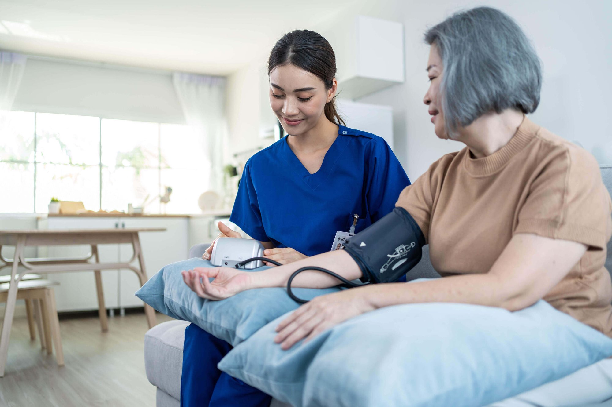 Home healthcare person working with a woman