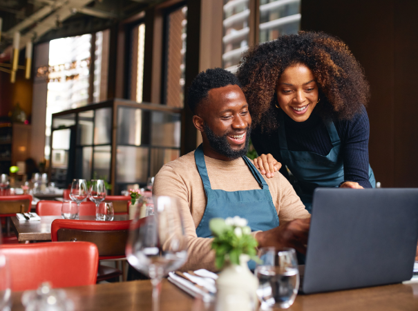 Restaurant workers with computer